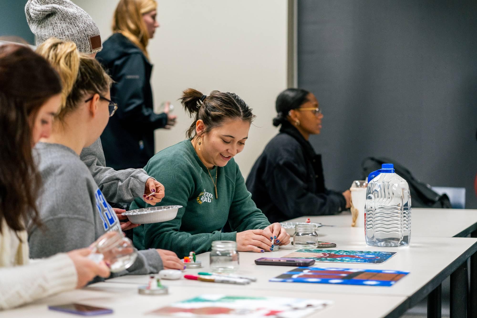 Students making their own snow globes